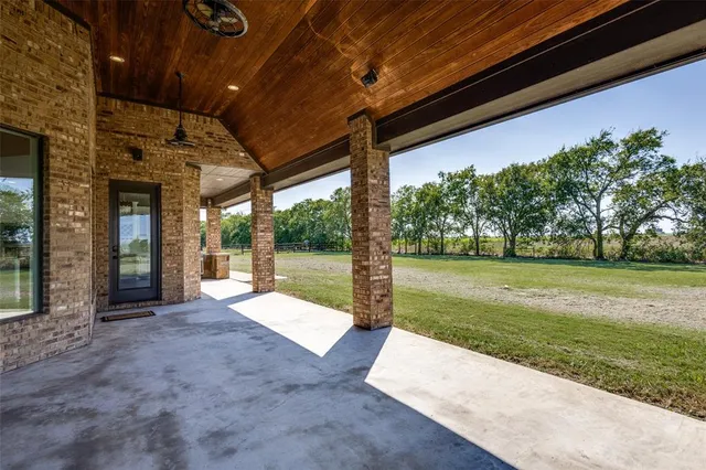 a view of backyard with green space
