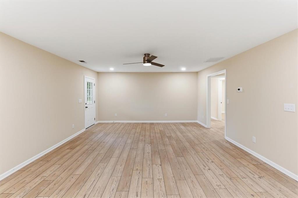 279 Taff Road Taylorsville, GA 30178 - Photo 11 of 36 wooden floor in an empty room with a window