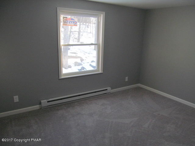 334 Canterbury Road Bushkill, PA 18324 - Photo 13 of 20 an empty room with a window