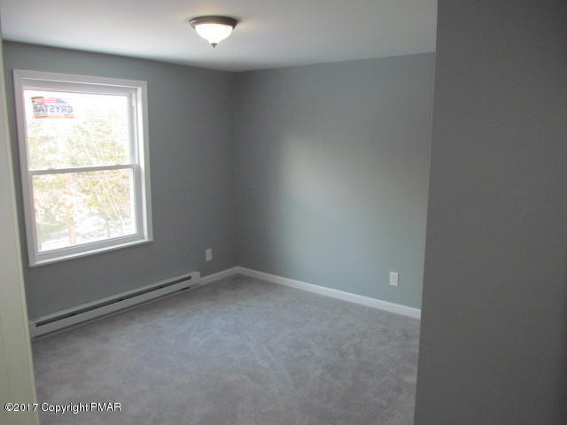 334 Canterbury Road Bushkill, PA 18324 - Photo 15 of 20 an empty room with a window