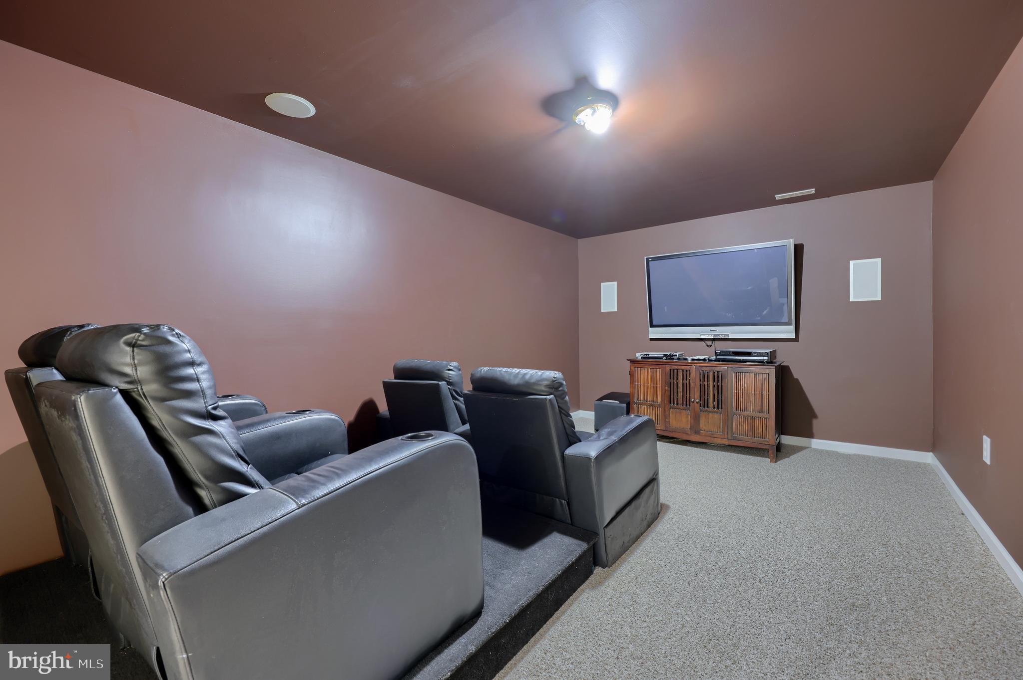 18183 Piedmont Road Stewartstown, PA 17363 - Photo 40 of 81 a living room with furniture and a flat screen tv
