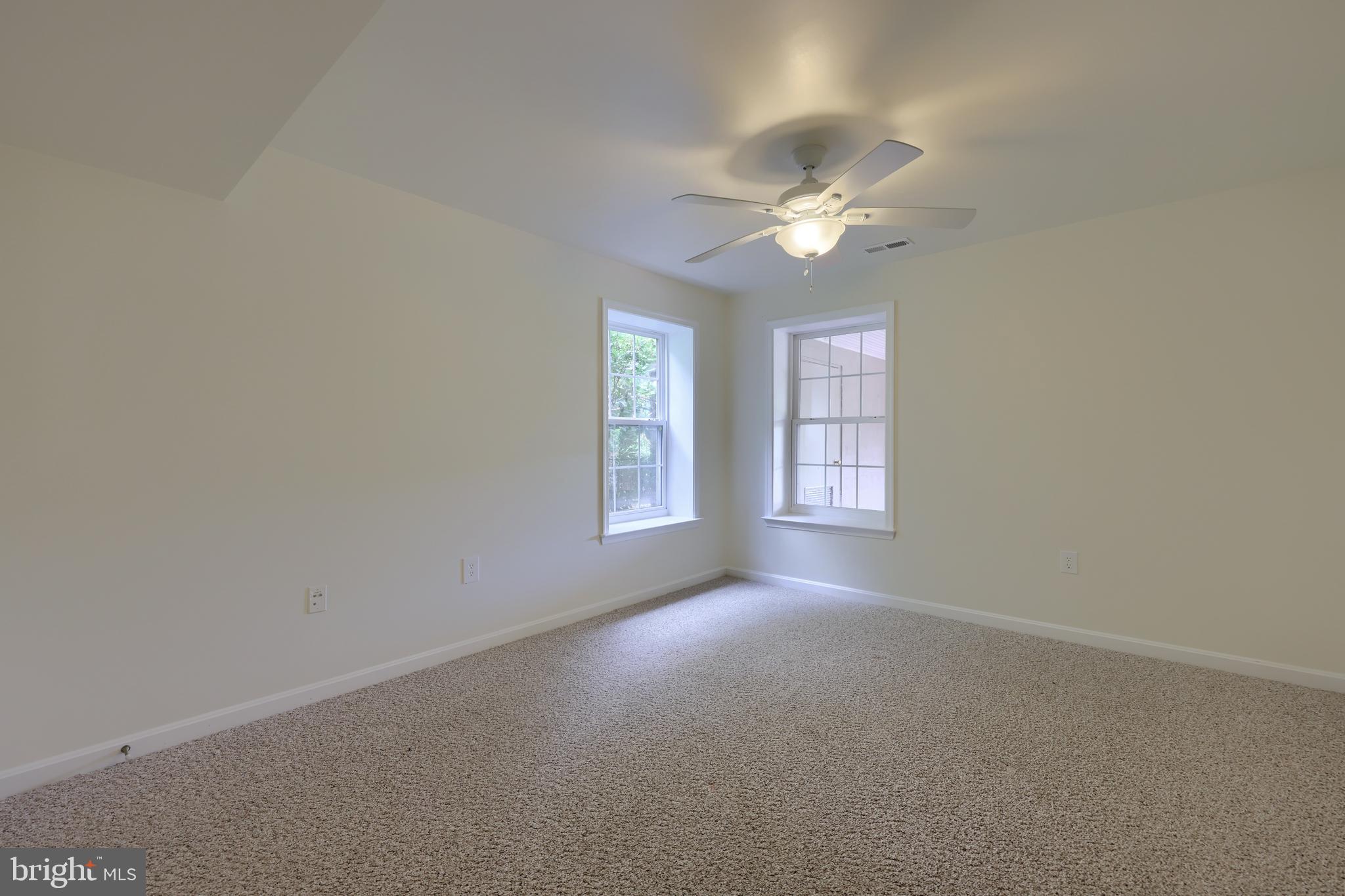 18183 Piedmont Road Stewartstown, PA 17363 - Photo 44 of 81 a view of a room with a ceiling fan and a window