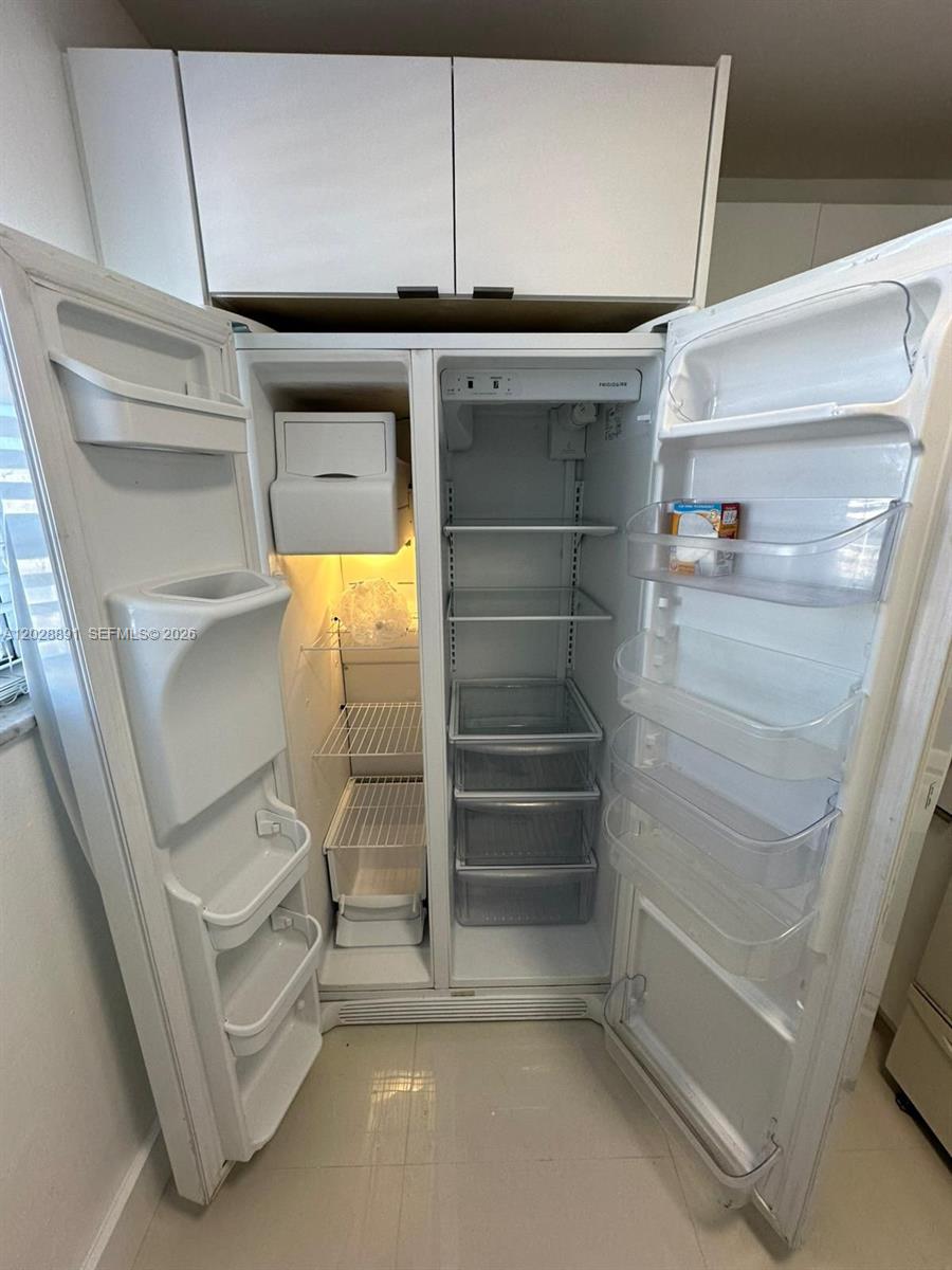 14170 Southwest 84th Street, Unit 402F Miami, FL 33183 - Photo 12 of 36 Refrigerator