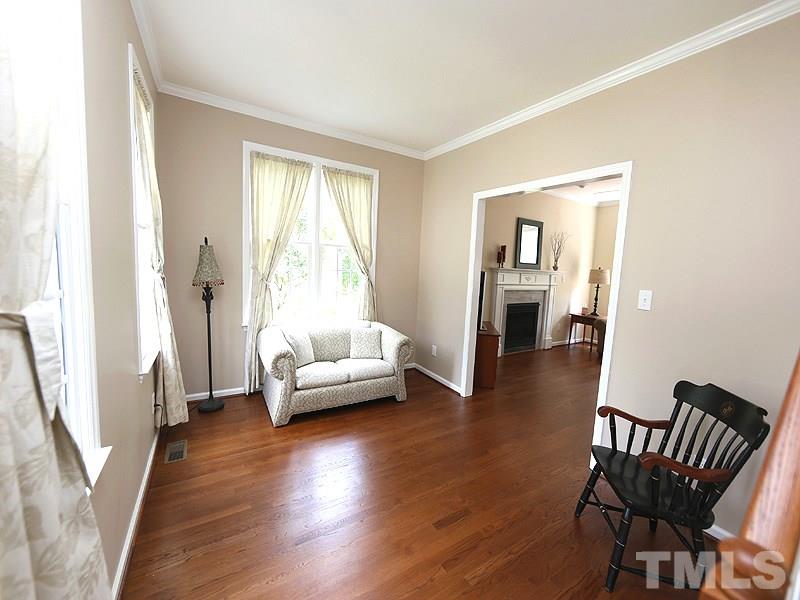 2608 Westmill Court Raleigh, NC 27613 - Photo 4 of 21 This room would make a great study or reading space with the abundant natural light.
