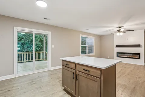 a kitchen with a stove and a sink