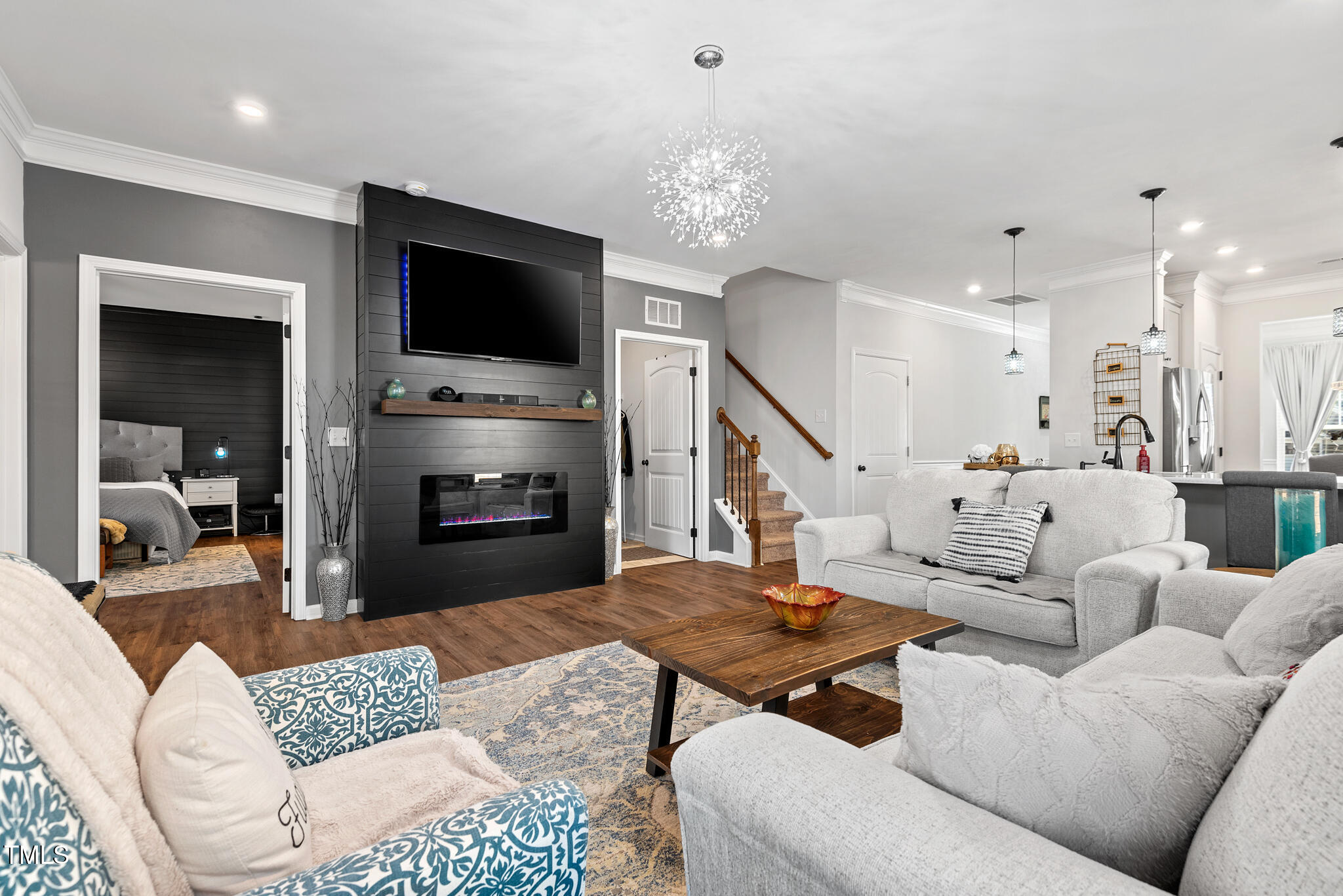 3416 Cross Timber Lane Raleigh, NC 27603 - Photo 15 of 47 a living room with furniture and a flat screen tv