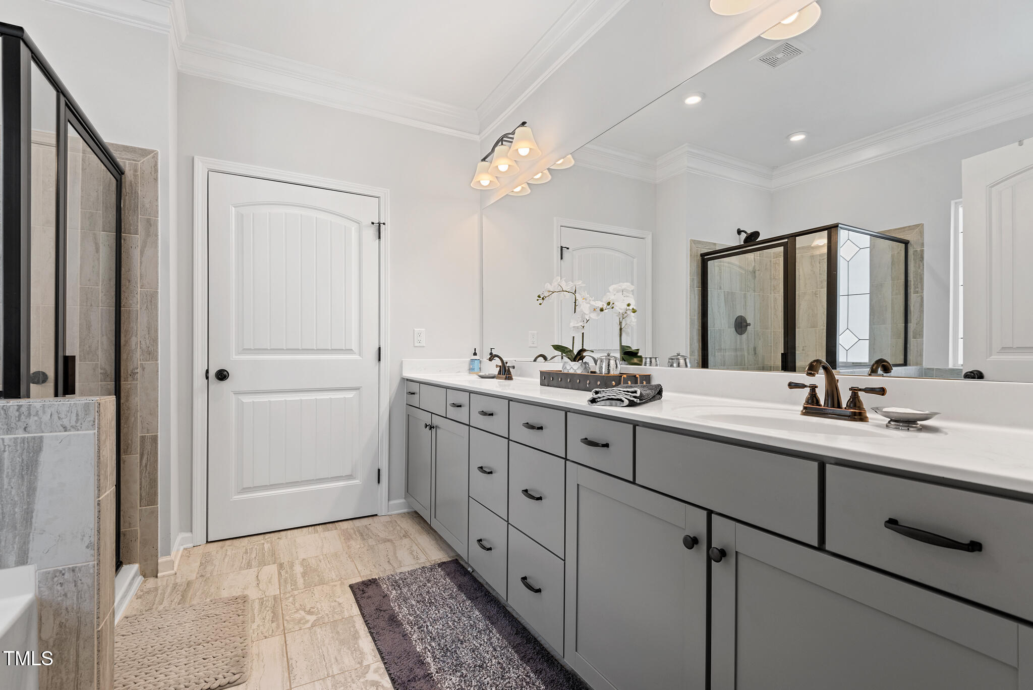 3416 Cross Timber Lane Raleigh, NC 27603 - Photo 23 of 47 a bathroom with a double vanity sink mirror and