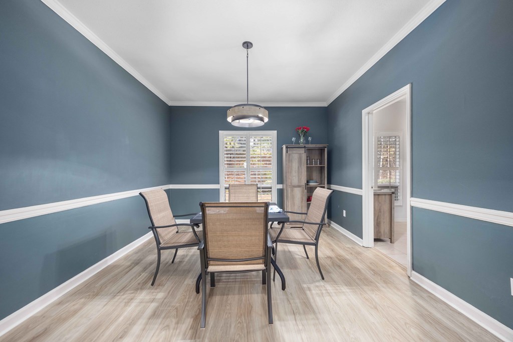 6500 Standing Boy Road, Unit 24 Columbus, GA 31904 - Photo 12 of 23 a dining room with furniture window wooden floor