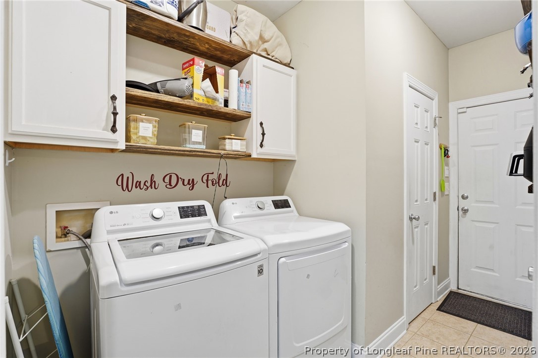 16 Ridge Road Jackson Springs, NC 27281 - Photo 35 of 50 a utility room with dryer and washer