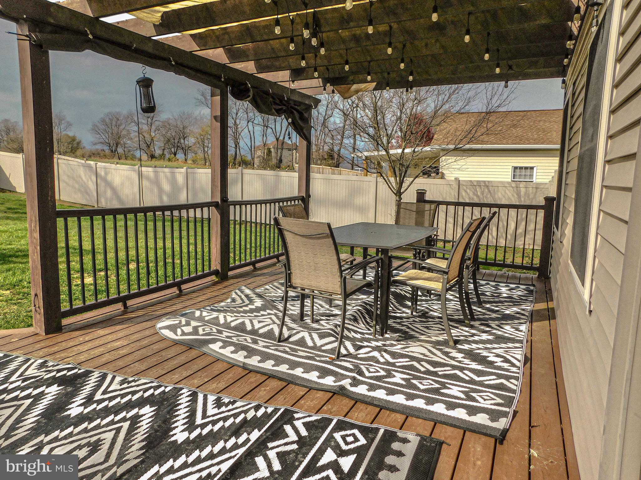1114 West Springfield Drive Bellefonte, PA 16823 - Photo 37 of 43 a view of a porch with furniture and wooden floor