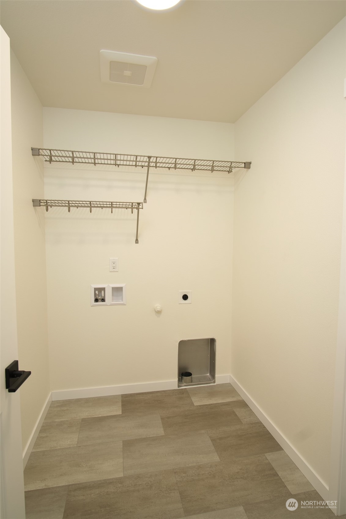 708 Cardinal Avenue Winlock, WA 98596 - Photo 11 of 28 a view of a room with racks on the wall