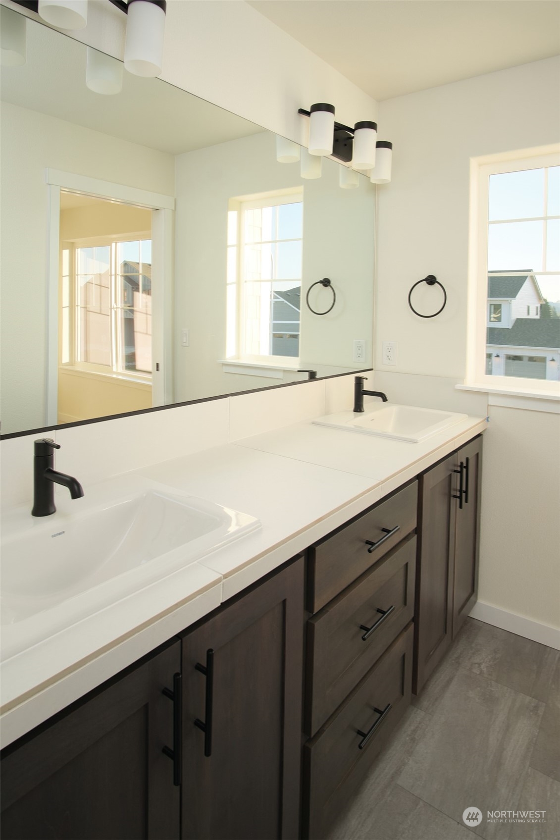708 Cardinal Avenue Winlock, WA 98596 - Photo 22 of 28 a bathroom with a sink and a mirror