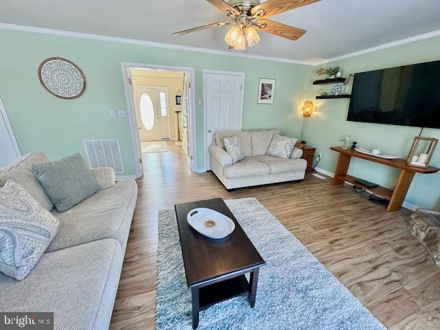 1234 Kelley Neck Road Lancaster, VA 22503 - Photo 11 of 71 a living room with furniture and a flat screen tv