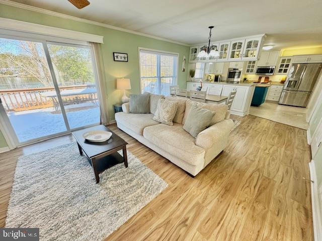 1234 Kelley Neck Road Lancaster, VA 22503 - Photo 12 of 71 a living room with furniture and a table