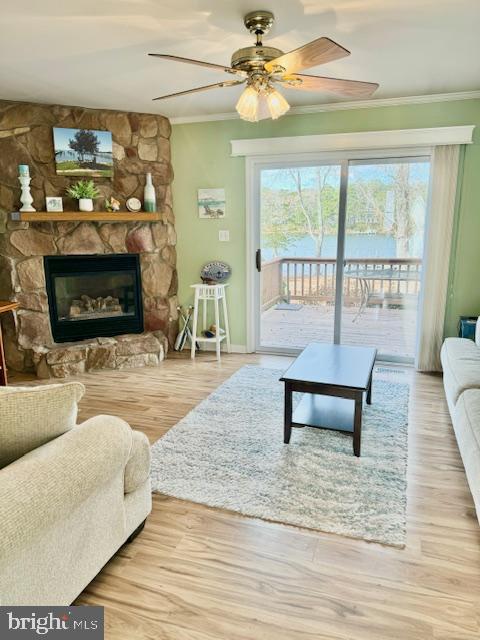 1234 Kelley Neck Road Lancaster, VA 22503 - Photo 15 of 71 a living room with furniture and a fireplace