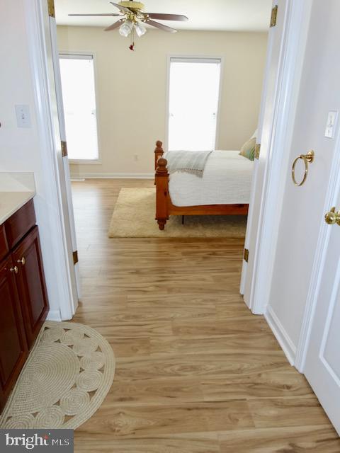1234 Kelley Neck Road Lancaster, VA 22503 - Photo 29 of 71 a bathroom with a bathtub and a window