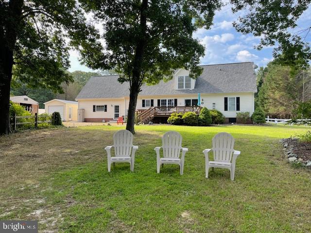 1234 Kelley Neck Road Lancaster, VA 22503 - Photo 57 of 71 a view of a house with a yard porch and sitting area