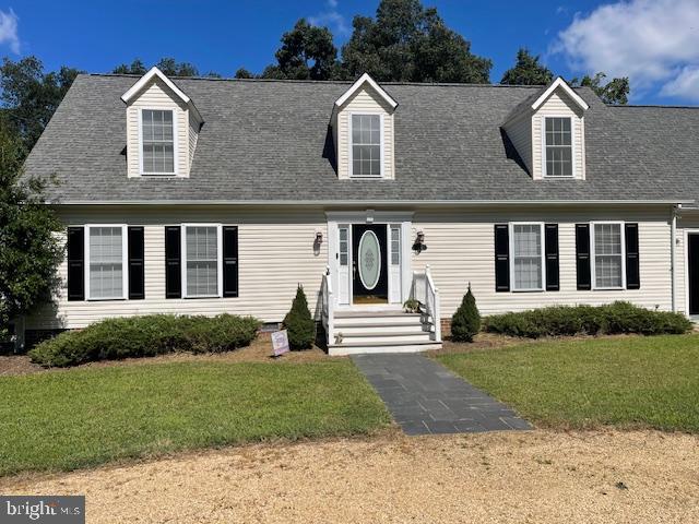 1234 Kelley Neck Road Lancaster, VA 22503 - Photo 60 of 71 a front view of a house with a yard