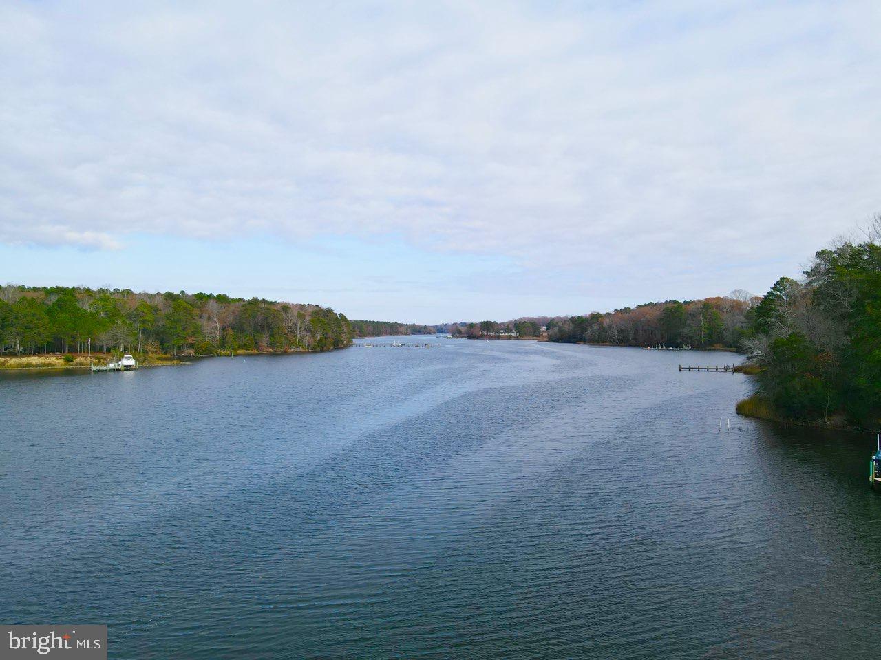 1234 Kelley Neck Road Lancaster, VA 22503 - Photo 61 of 71 a view of a lake and mountain in the back