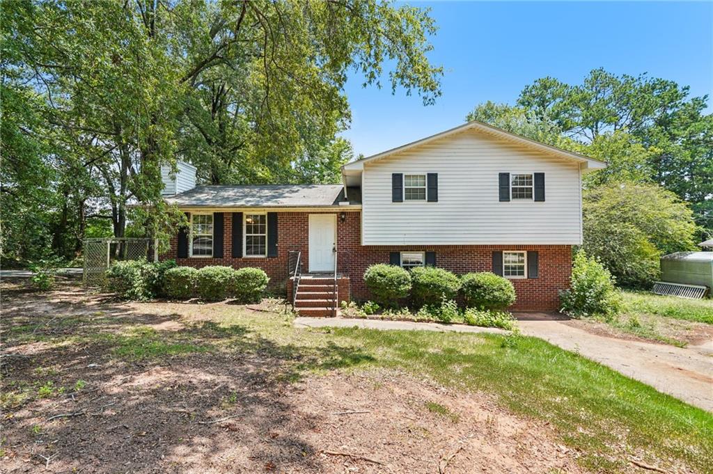 501 Forest Street Monroe, GA 30655 - Photo 1 of 1 a front view of house with yard and green space
