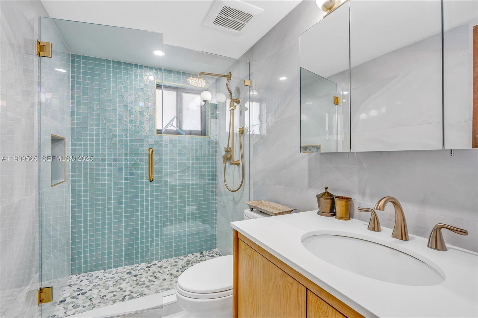 877 Ellen Drive Key Largo, FL 33037 - Photo 23 of 39 a bathroom with a sink a toilet and shower