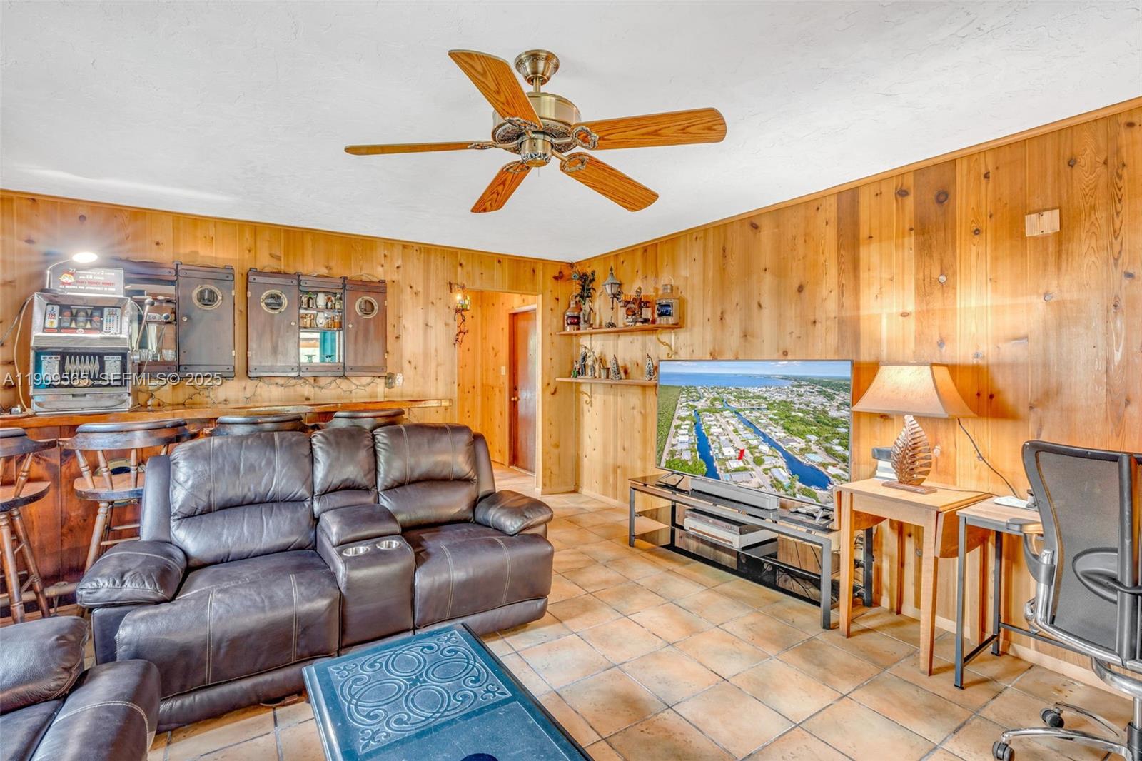 877 Ellen Drive Key Largo, FL 33037 - Photo 25 of 39 a work room with furniture and a large window