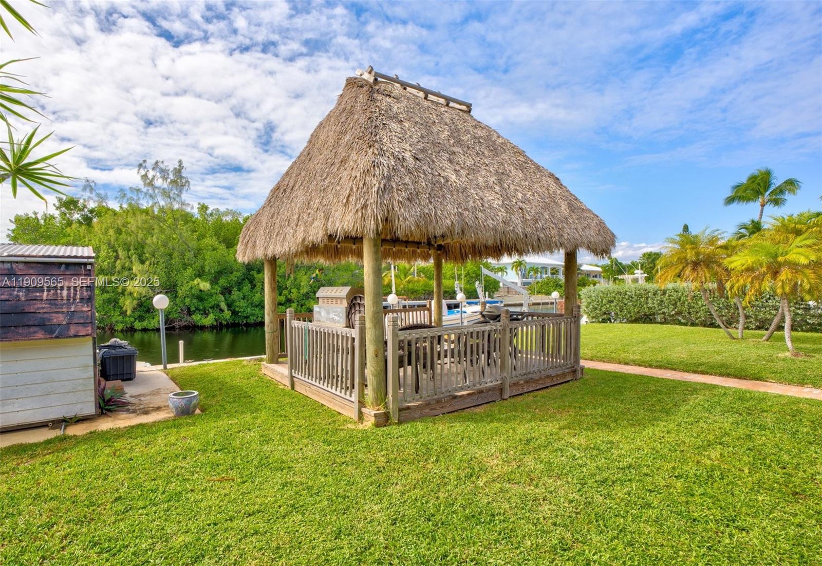 877 Ellen Drive Key Largo, FL 33037 - Photo 31 of 39 a view of a deck with a yard