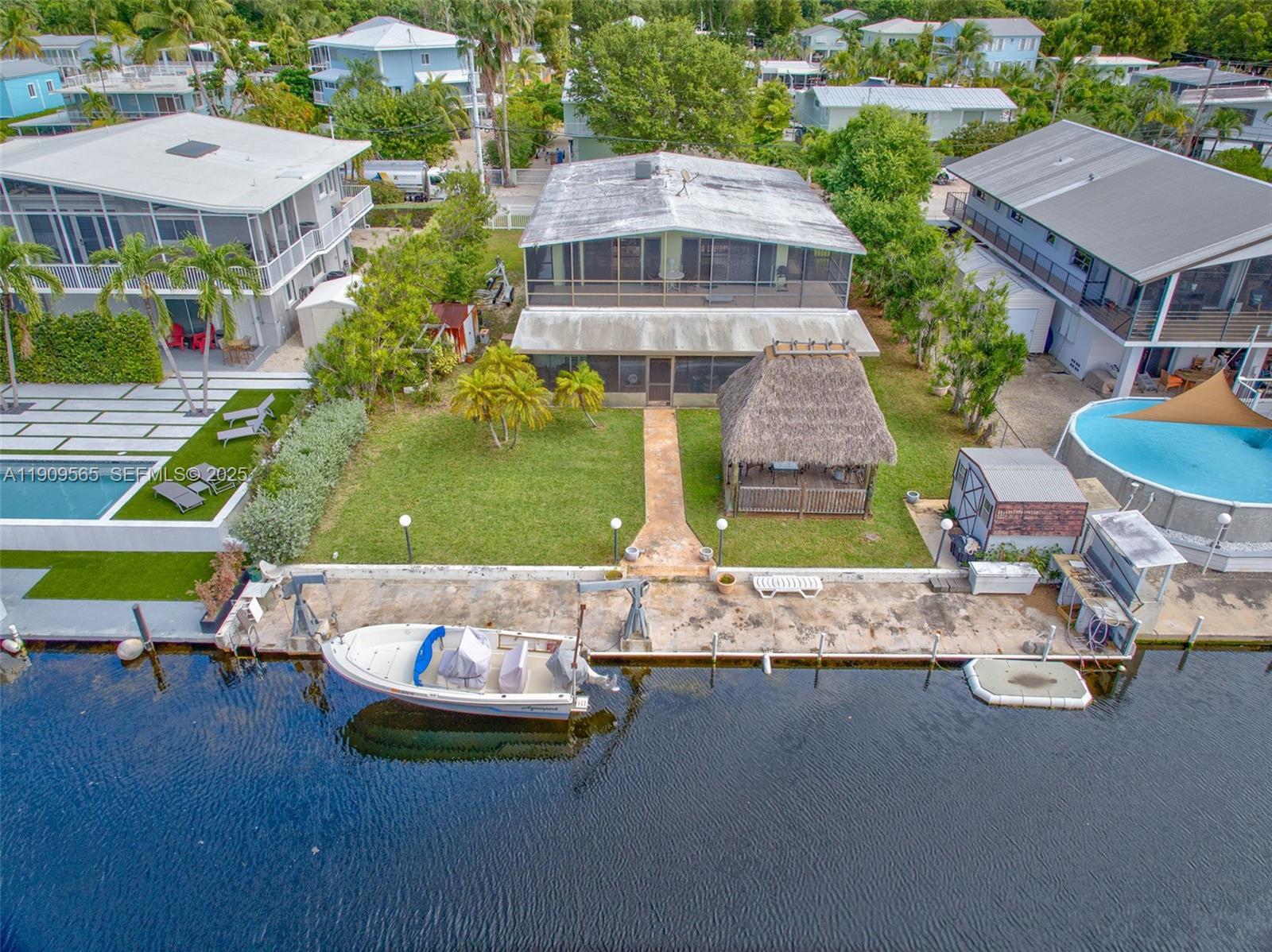 877 Ellen Drive Key Largo, FL 33037 - Photo 36 of 39 an aerial view of a house with swimming pool yard and outdoor seating