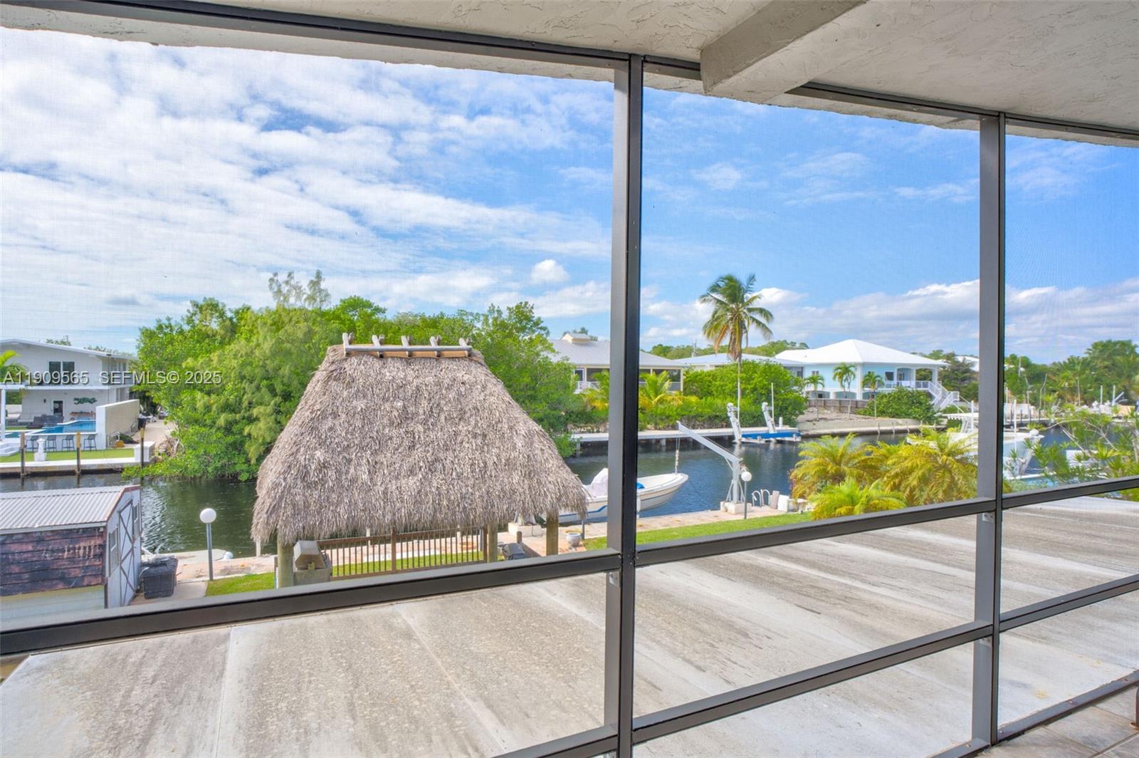 877 Ellen Drive Key Largo, FL 33037 - Photo 6 of 39 a view of a building from a window
