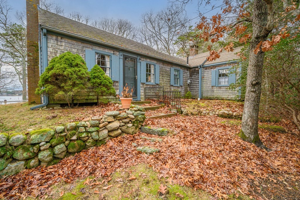 141 Nyes Neck Road Barnstable, MA 02632 - Photo 29 of 31 a front view of a house with garden