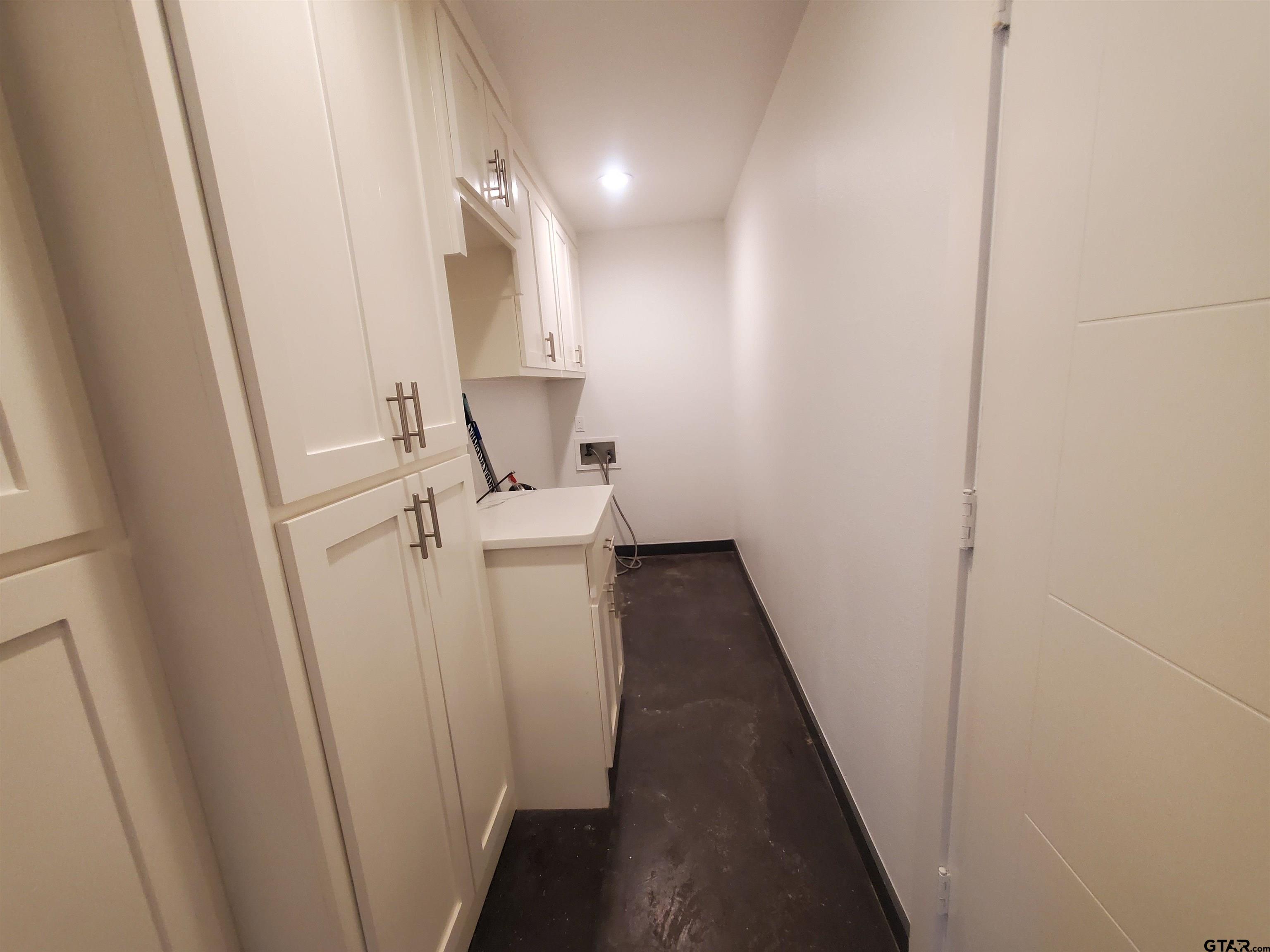 2917 Amy Lane Tyler, TX 75701 - Photo 26 of 36 a view of a hallway with wooden floor and staircase