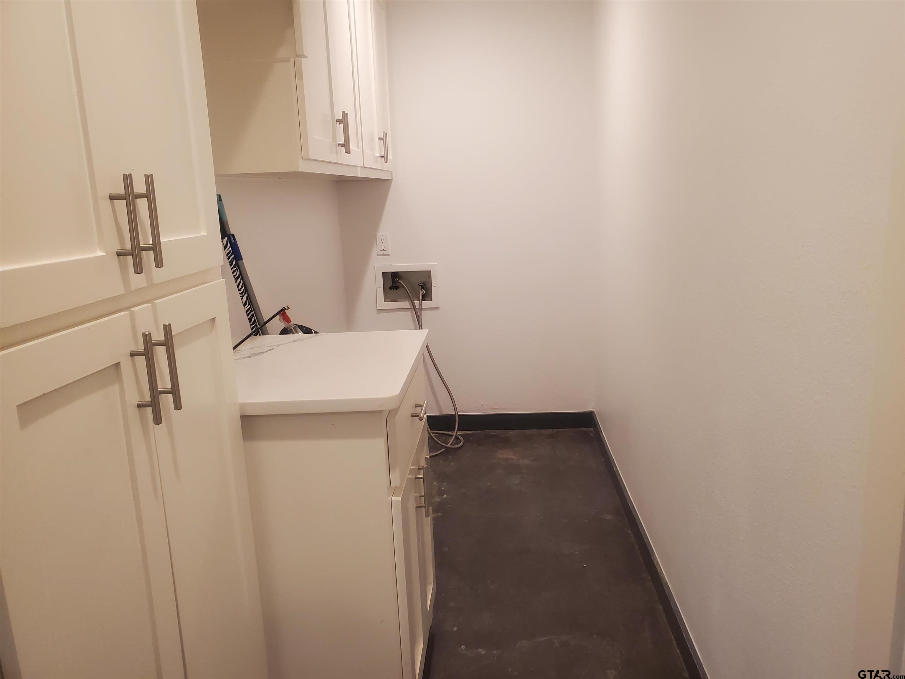 2917 Amy Lane Tyler, TX 75701 - Photo 27 of 36 a utility room with dryer and washer