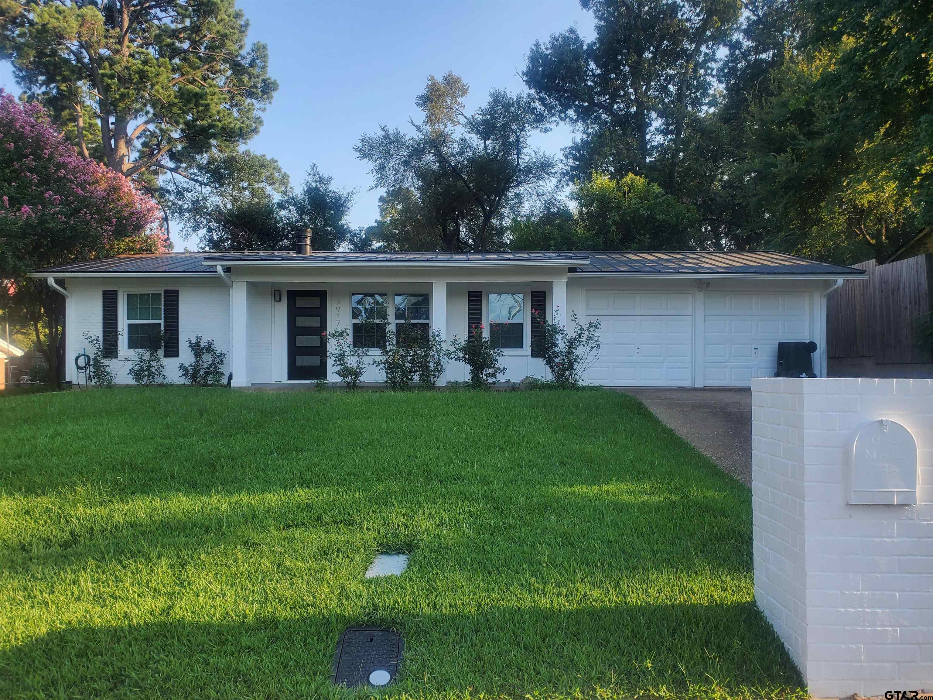 2917 Amy Lane Tyler, TX 75701 - Photo 3 of 36 a view of house that has a yard