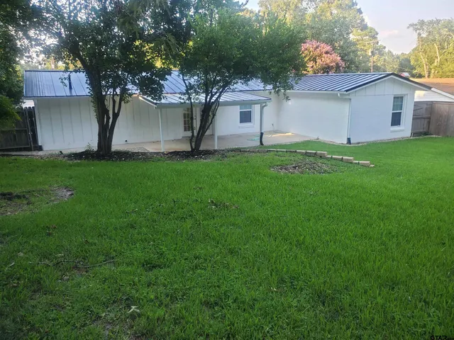 a view of a backyard with a garden