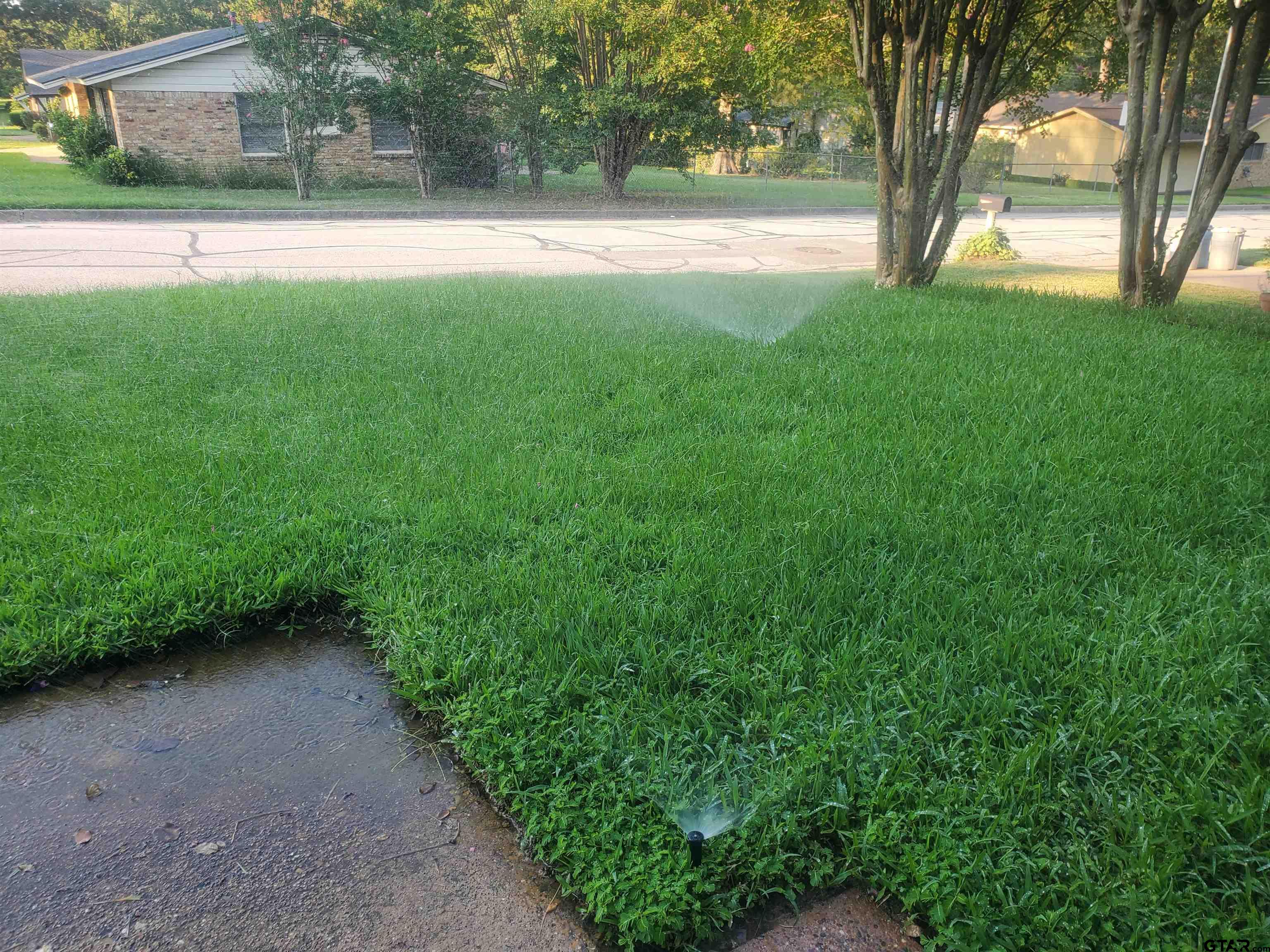 2917 Amy Lane Tyler, TX 75701 - Photo 36 of 36 a view of outdoor space with deck area and trees