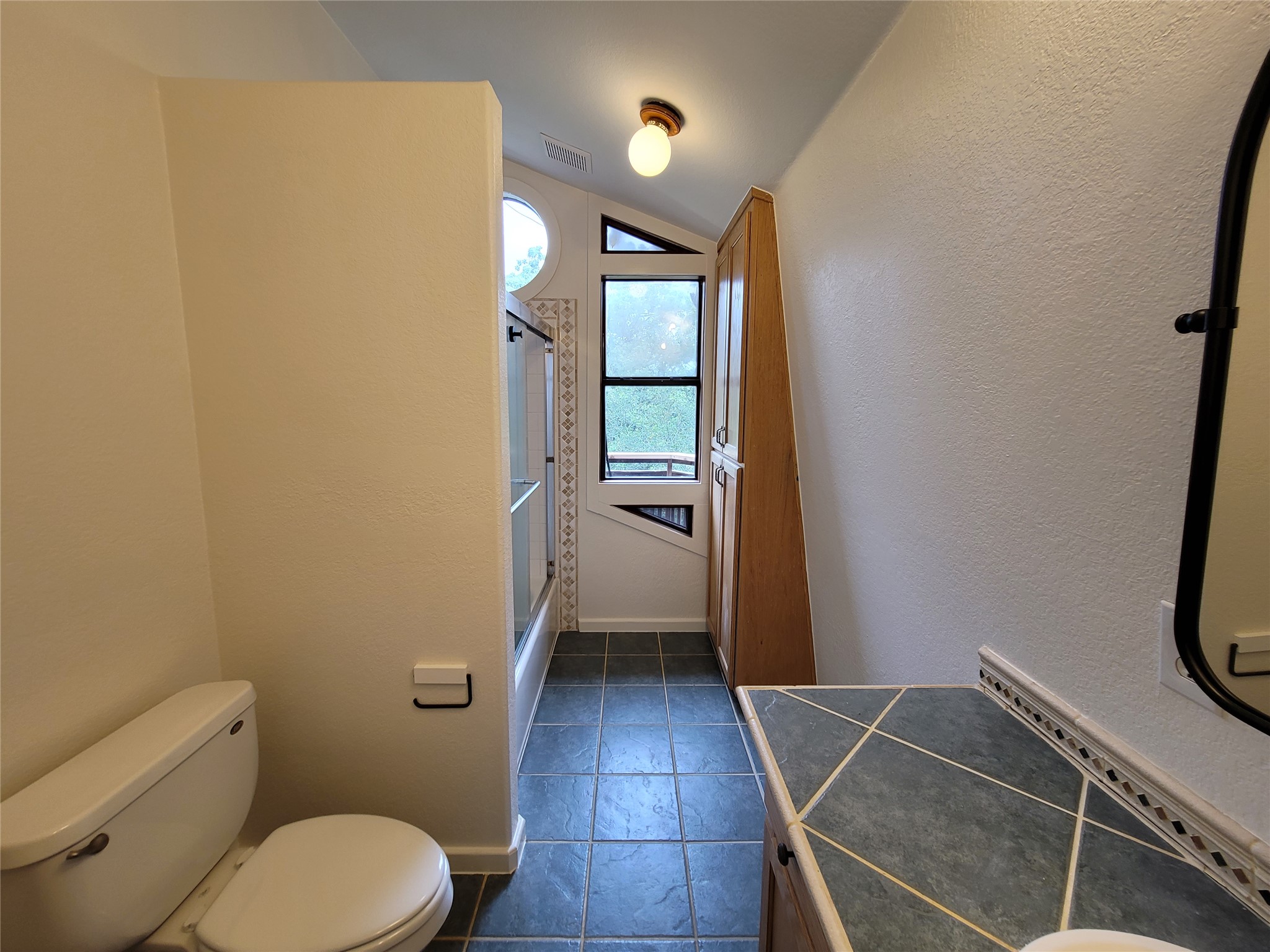 281 Earl Callahan Road, Unit A Cedar Creek, TX 78612 - Photo 24 of 39 a bathroom with a toilet