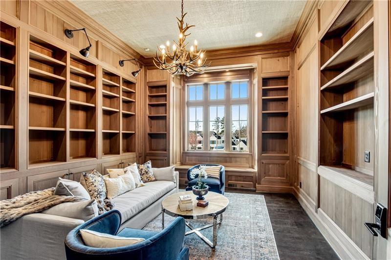 560 Lost River Bend Milton, GA 30004 - Photo 17 of 62 a living room with furniture potted plant and a window