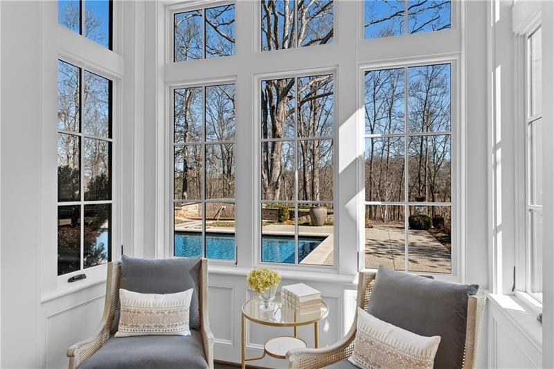 560 Lost River Bend Milton, GA 30004 - Photo 27 of 62 a balcony with couple of chairs and a window