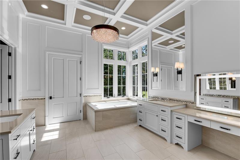 560 Lost River Bend Milton, GA 30004 - Photo 31 of 62 a large white kitchen with a large window