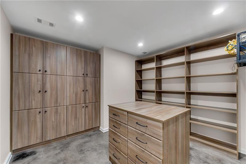 560 Lost River Bend Milton, GA 30004 - Photo 41 of 62 a room with storage and utility