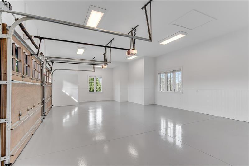 560 Lost River Bend Milton, GA 30004 - Photo 47 of 62 a view of a hallway with window and stairs