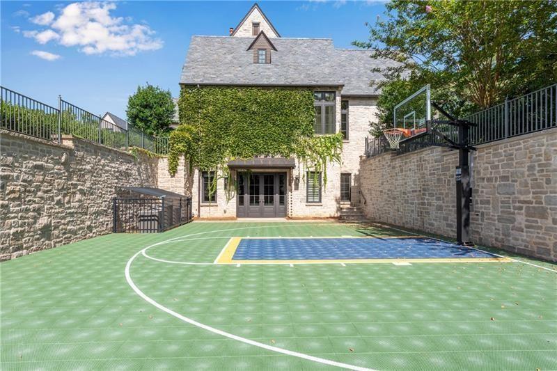 560 Lost River Bend Milton, GA 30004 - Photo 48 of 62 a view of a house with basketball court