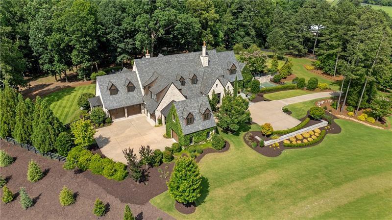 560 Lost River Bend Milton, GA 30004 - Photo 49 of 62 an aerial view of a house with outdoor space