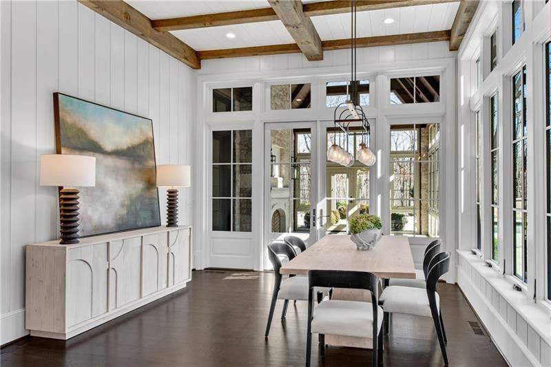 560 Lost River Bend Milton, GA 30004 - Photo 7 of 62 a view of a dining room with furniture window and wooden floor