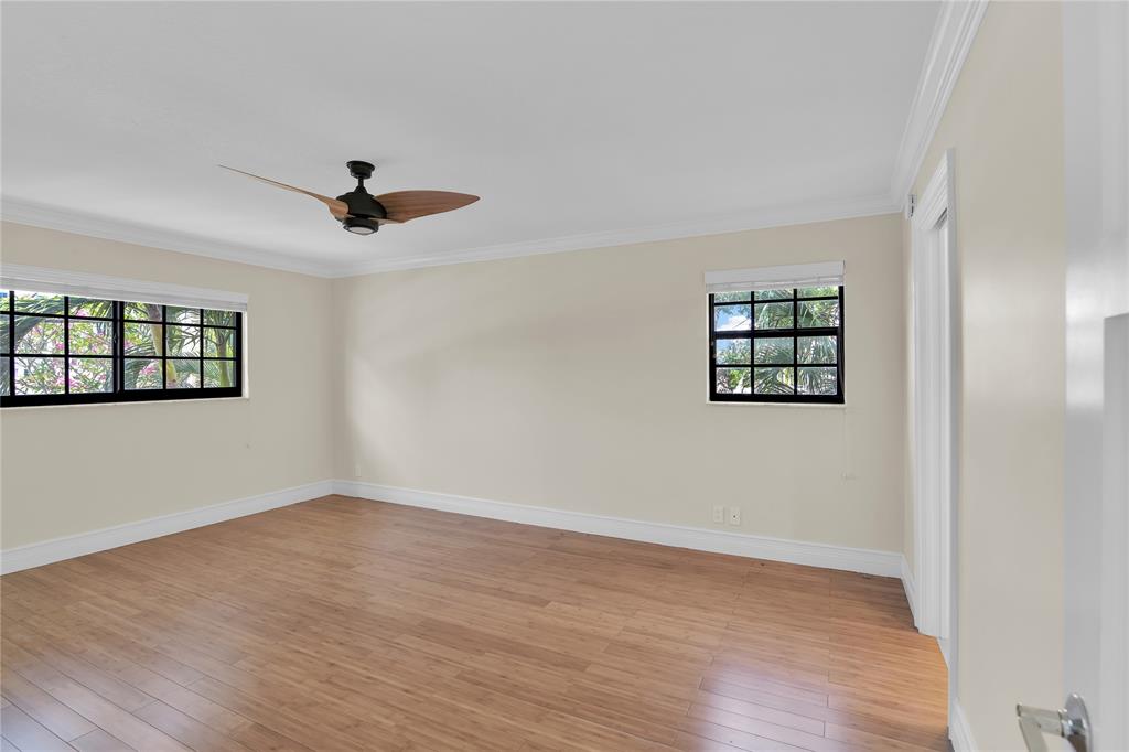 250 East Royal Palm Road, Unit 2A Boca Raton, FL 33432 - Photo 15 of 26 wooden floor in an empty room with a window