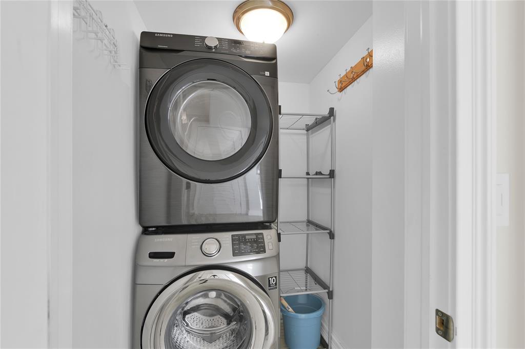 250 East Royal Palm Road, Unit 2A Boca Raton, FL 33432 - Photo 7 of 26 a utility room with dryer and washer