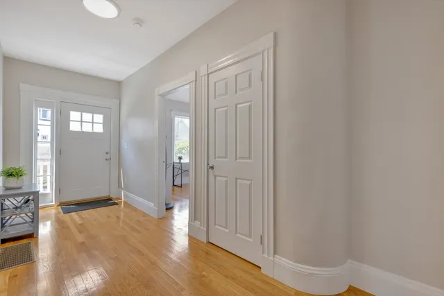 a workspace with furniture and wooden floor
