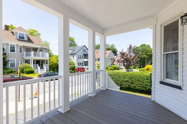 a view of a porch with wooden floor and outdoor space