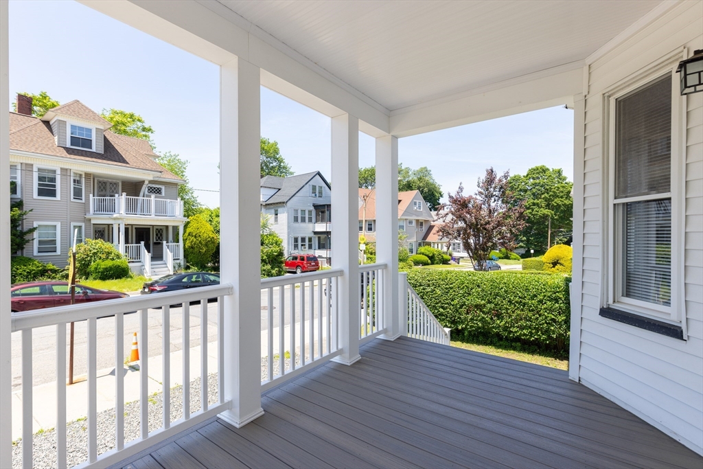 24 Bentley Street, Unit 1 Boston, MA 02135 - Photo 2 of 21 a view of a porch with wooden floor and outdoor space
