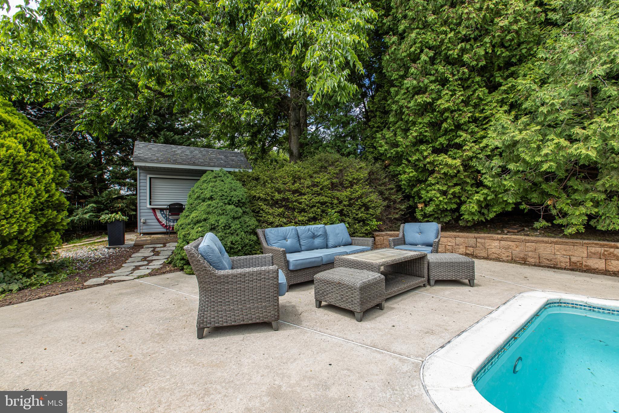216 Revere Road Marlton, NJ 08053 - Photo 35 of 47 a view of a patio with couches and a fire pit